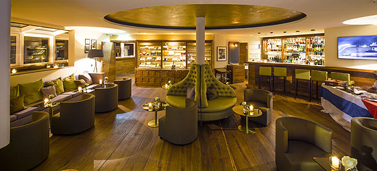 Ein Ort des anspruchsvollen Genusses: Die Cigar-Lounge im Kitzbühel Country Club. Foto: Kitzbühel Country Club